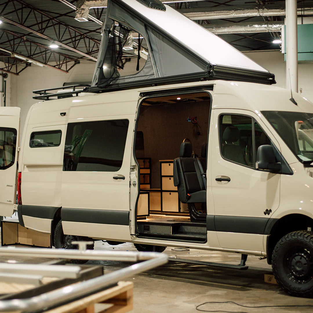 Mercedes Sprinter van with CloudCap tent poptop.