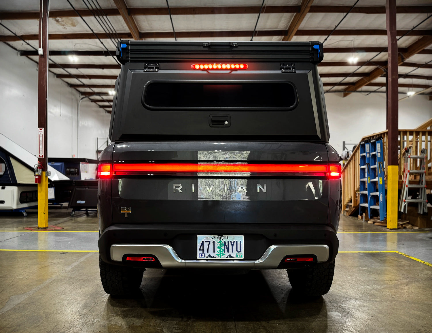 EV Rivian R1T with X1 truck camper from Super Pacific.