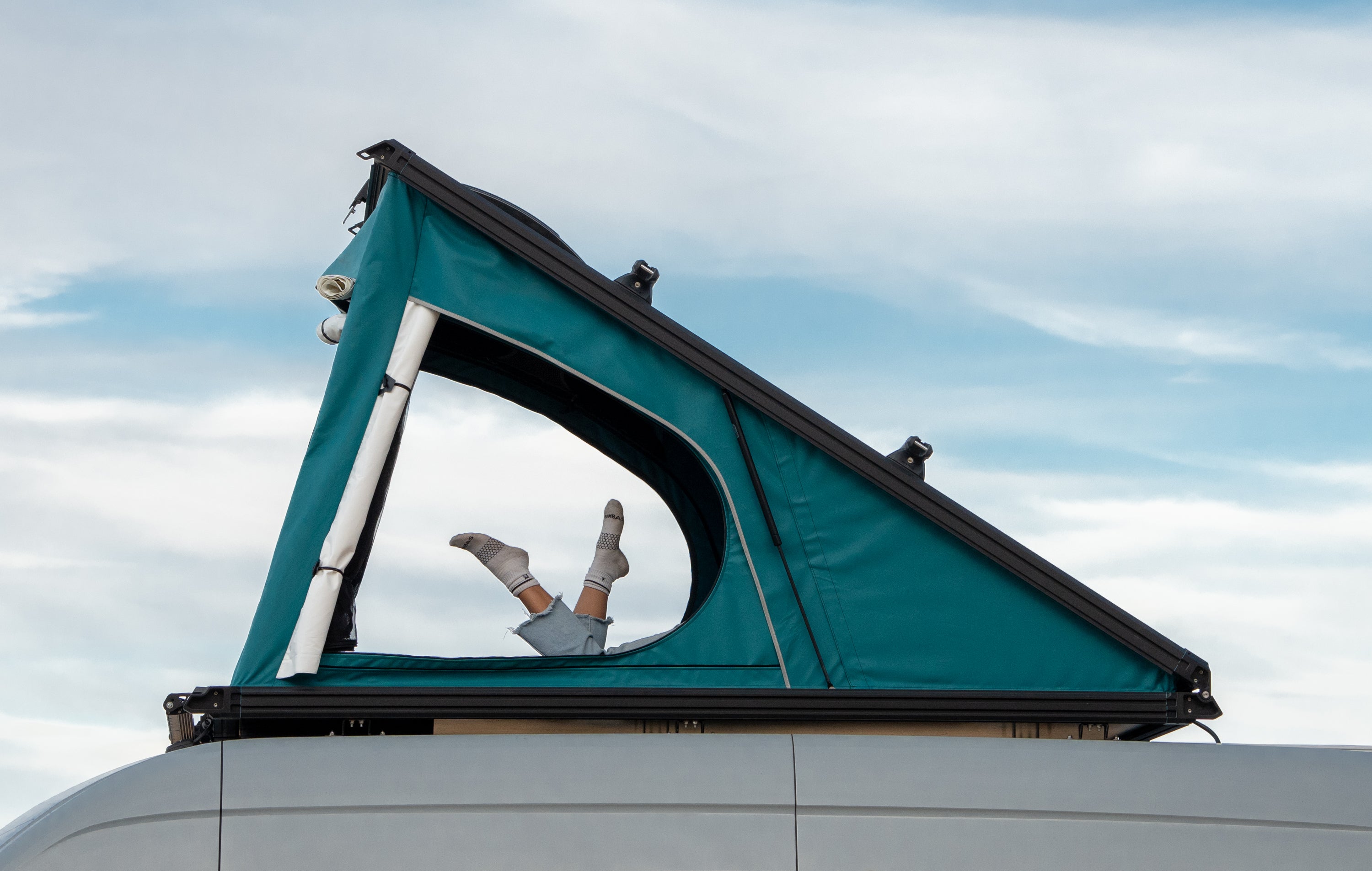 Mercedes Sprinter van with CloudCap van poptop and rooftop tent.