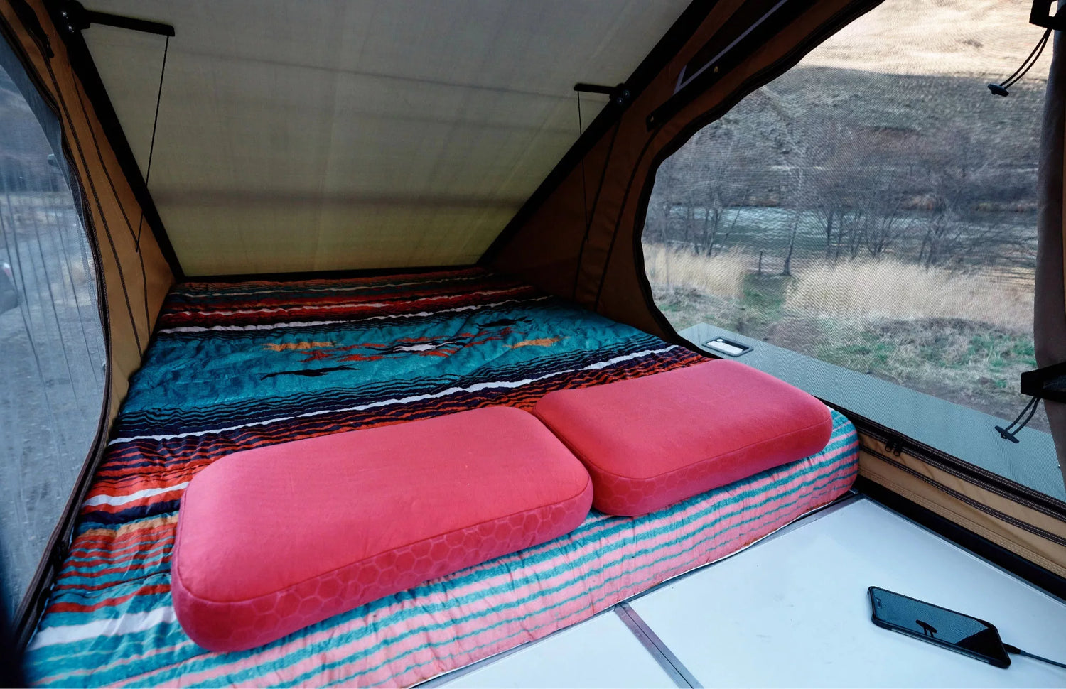 Comfortable sleeping area of the X1 Camper from Super Pacific for Rivian R1T all-electric truck.