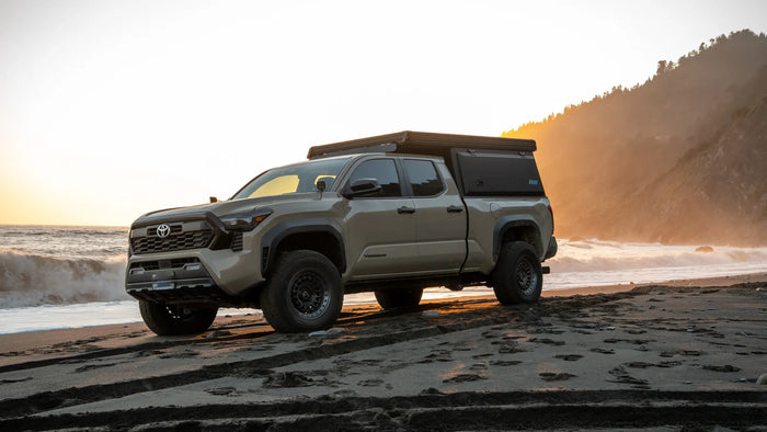 a beautiful truck enjoys a pacific sunset