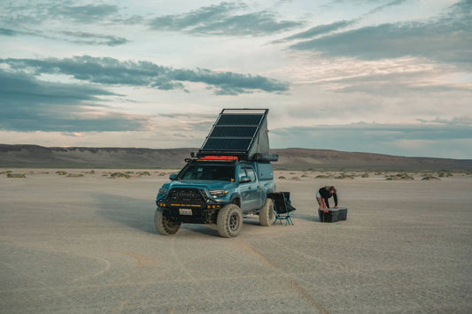 Toyota Tacoma equipped with X1 Camper in the desert.