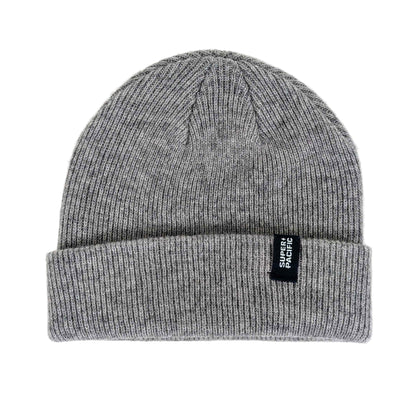 Gray knit beanie with a brand label on a white background