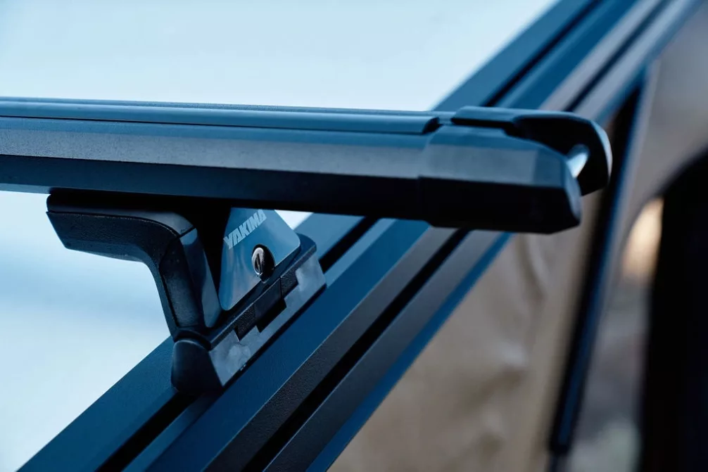 Close-up of Yakima rack mounted to the t-slots on the roof of the X1 Camper.